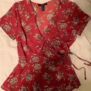 Floral print cross tied blouse